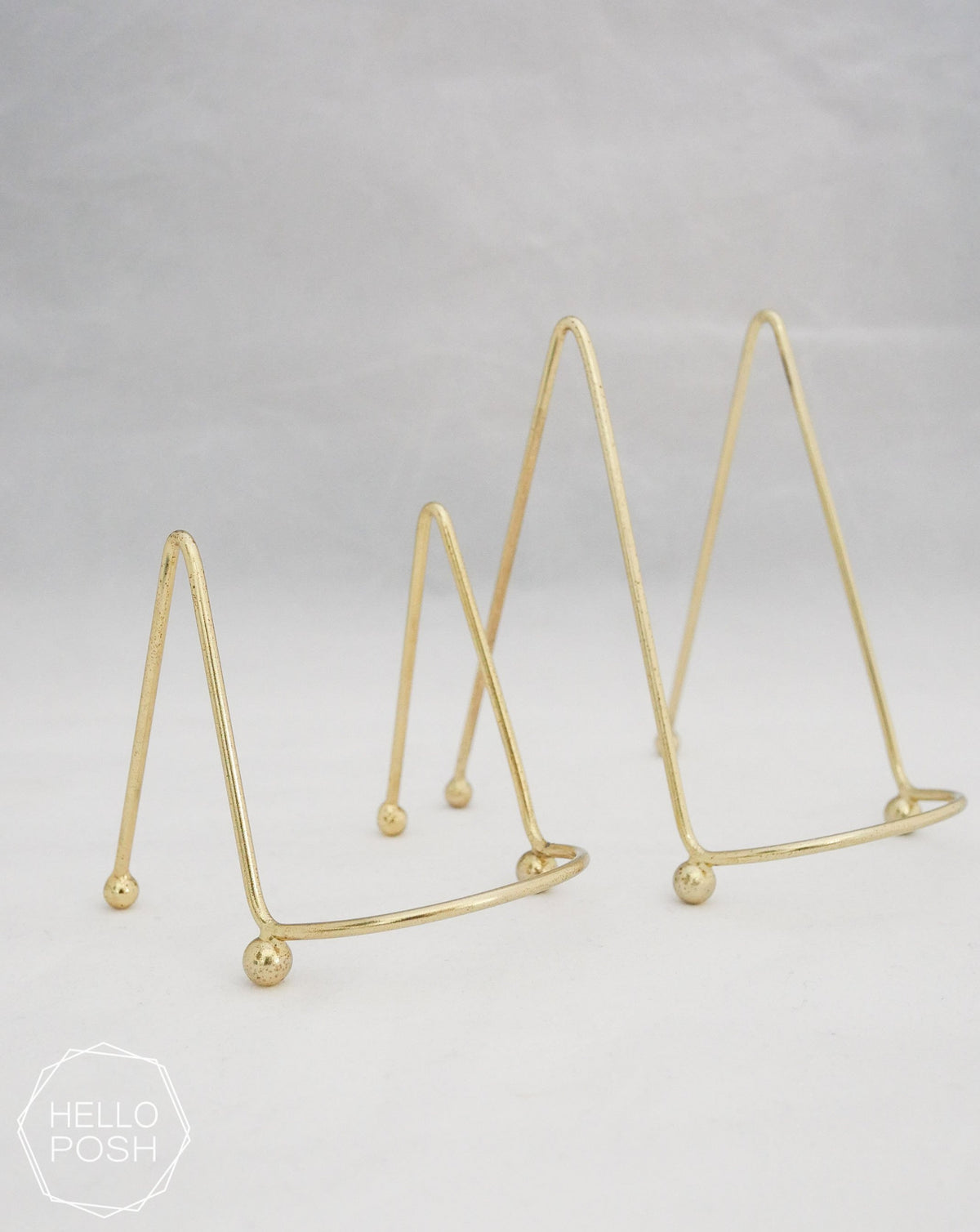 Small gold easels; Brass display stands